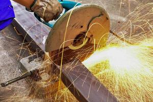 Sparks flying from machinery photo