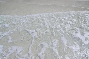 Shallow water at the beach photo