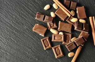 pieces of chocolate with almonds photo
