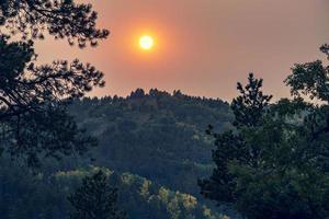 Red sky in the hills photo