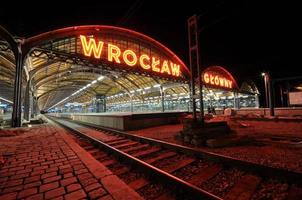 Railway entrance main station Wroclaw neon at night photo