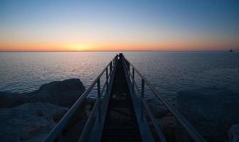 The Sun Comes up Over Lake Michigan Milwaukee Harbor photo