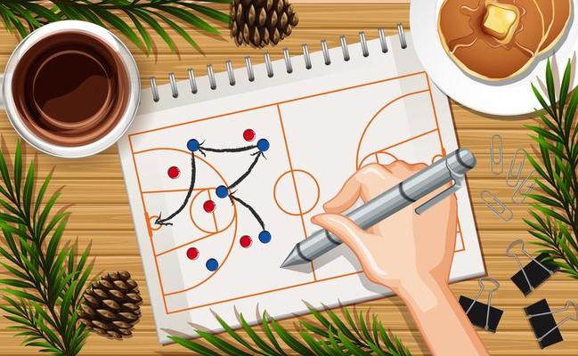 Hand drawing basketball plays on paper