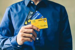 Businessman with credit card photo