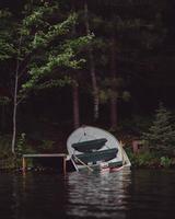 Abandoned boat on the shore photo