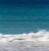 Panning of ocean waves photo