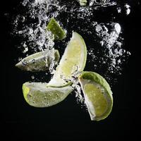 slices of lime underwater photo