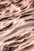 Sand during daytime photo