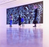 Sydney, Australia, 2020 - People looking at a large abstract painting photo