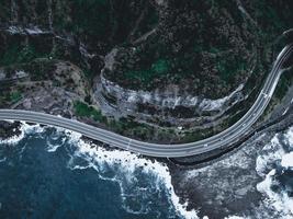 Aerial view of a road and mountain at night photo