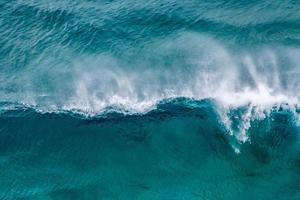 Aerial view of blue ocean waves photo