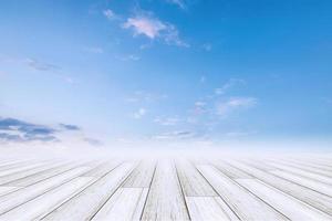 Wooden floor with sky background photo