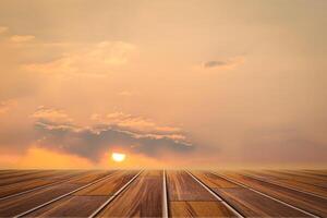 Wooden floor with sky background photo