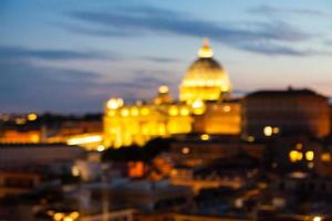 Blurry city lights with a domed building photo