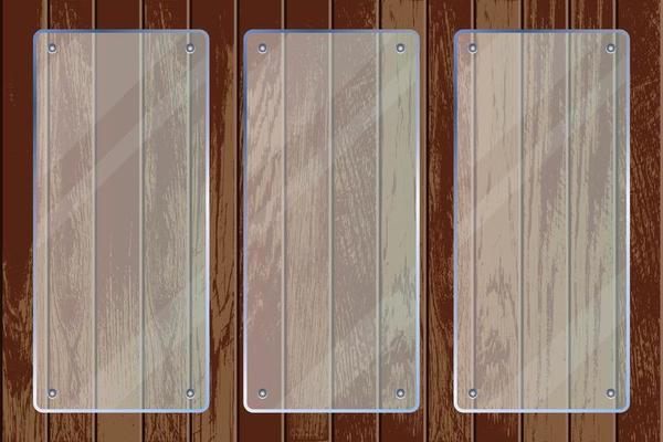 Rectangle transparent glass plates on wooden texture