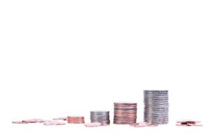 Stacked coins isolated on white background photo