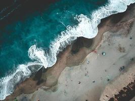 Aerial photography of tidal wave and sand photo