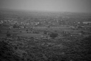 Grayscale aerial view of a city photo