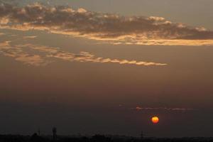 Clouds in the sky at dusk photo