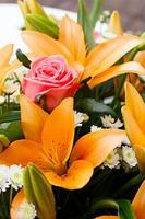 beautiful bridal bouquet of lilies and roses photo