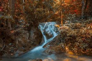 Waterfall in beautiful Autumn photo