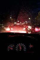 Abstract traffic accident  in raining day. View from car seat. photo