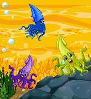 Many different squids cartoon character in the underwater background vector