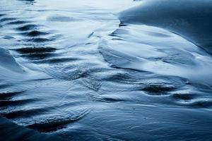 Close-up of wet sand photo