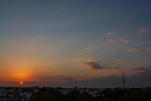 Sunset over a city photo