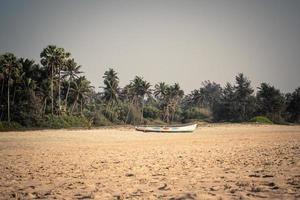 Boat on a beach photo