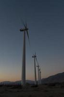 Wind turbines at sunset photo