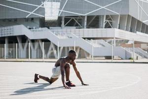 African American man stretching photo