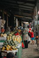 Unidentified people at a market in Indonesia photo