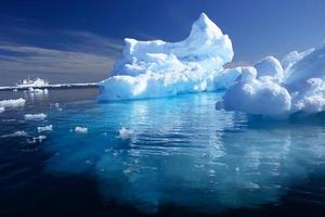 Iceberg and Ship in the Arctic photo