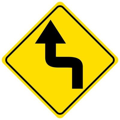 Left reverse turn ahead yellow sign on white background