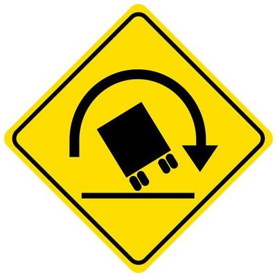 Truck rollover warning sign on white background