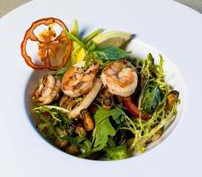 Scampi shrimp, vegetable salad close up photo