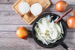 Chopped and halved onions photo