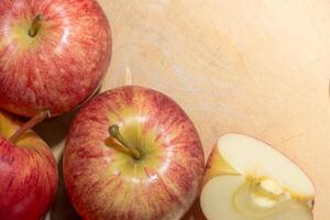 A table with apples and a knife photo