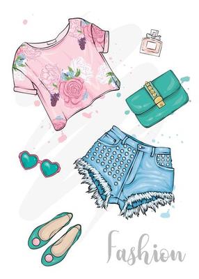 Set of stylish hand drawn women's clothing and accessories