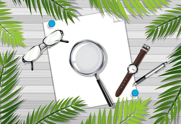 Top view of wooden table with office objects and leaves element