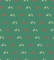 Seamless pattern with Christmas reindeers on green background vector
