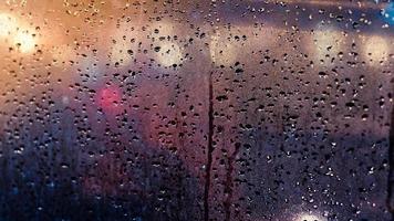 Abstract traffic lights in the rain photo