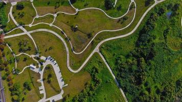 Aerial view of a road and parking lot on a hill photo