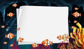 Blank paper template with exotic fishes cartoon character in the underwater scene vector