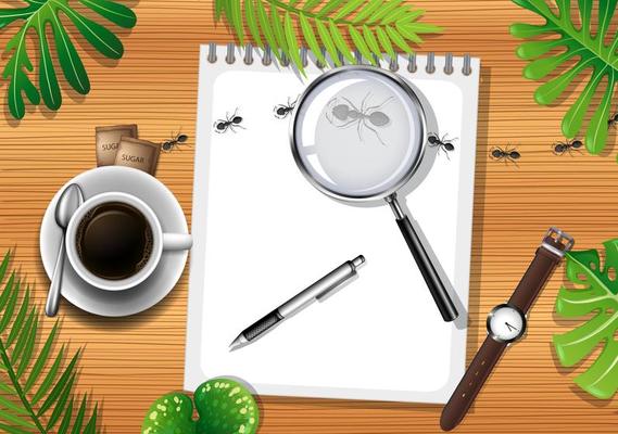 Top view of wooden table with office objects and leaves element