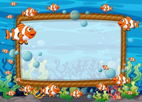 Blank frame template with exotic fishes cartoon character in the underwater scene