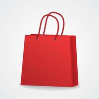 Realistic red shopping bag with rope handles vector