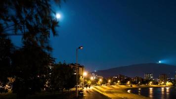 Zoom in timelapse of the full moon.mp4ing in the night sky 4K stock video