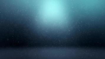Unterwasserszene von weißen Partikeln, die auf dunkelblauem Hintergrund schweben video